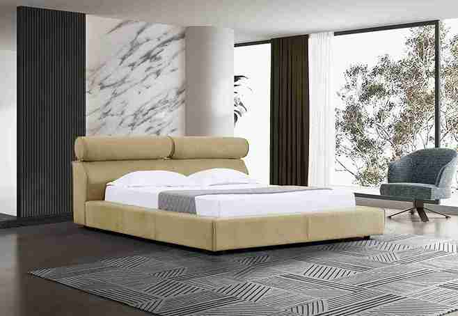 Lit avec tête de lit boudinée, alliant confort et design moderne. Idéal pour créer une ambiance chaleureuse et accueillante dans votre chambre.