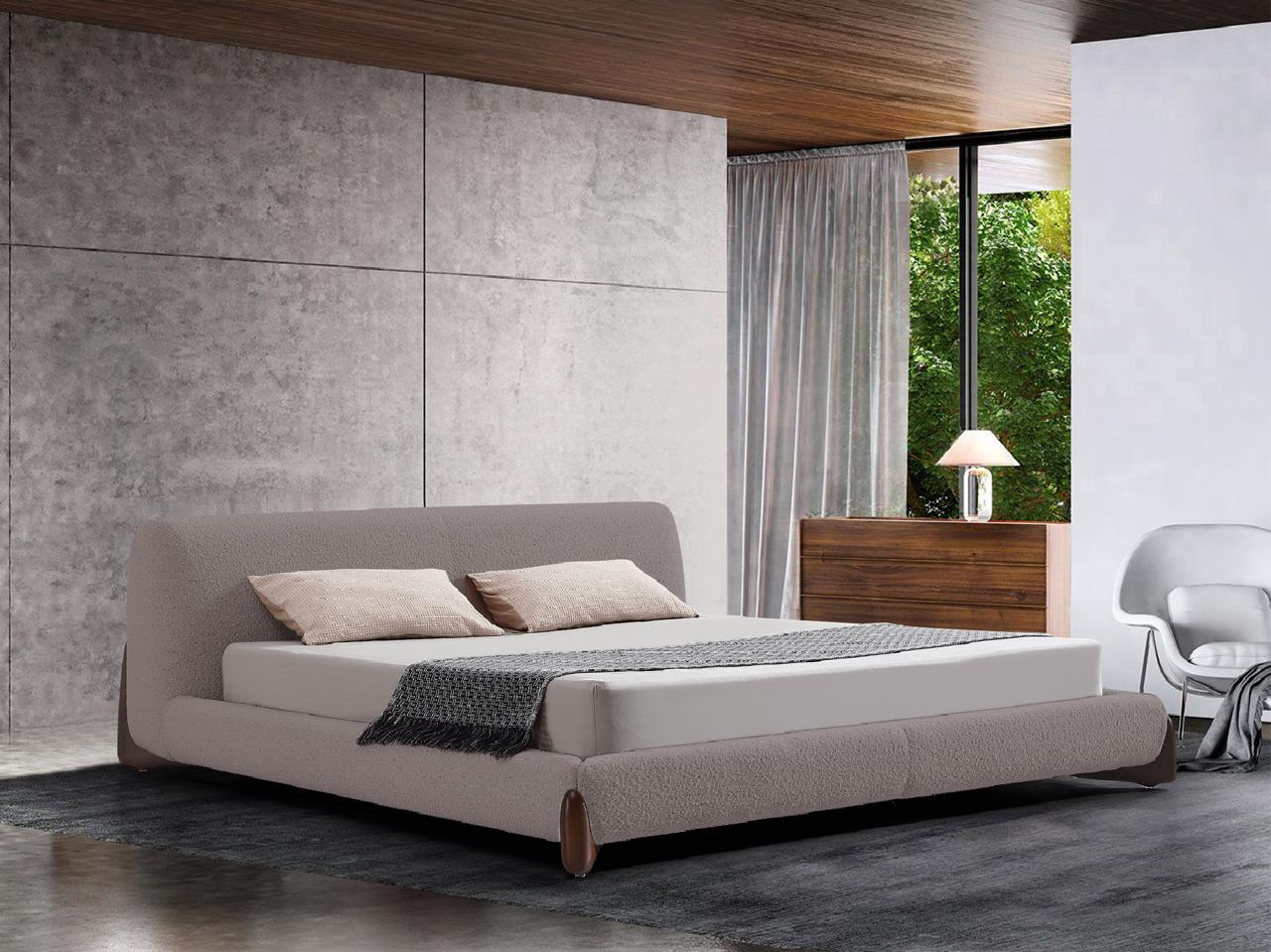 Lit avec tête de lit boudinée, alliant confort et design moderne. Idéal pour créer une ambiance chaleureuse et accueillante dans votre chambre.