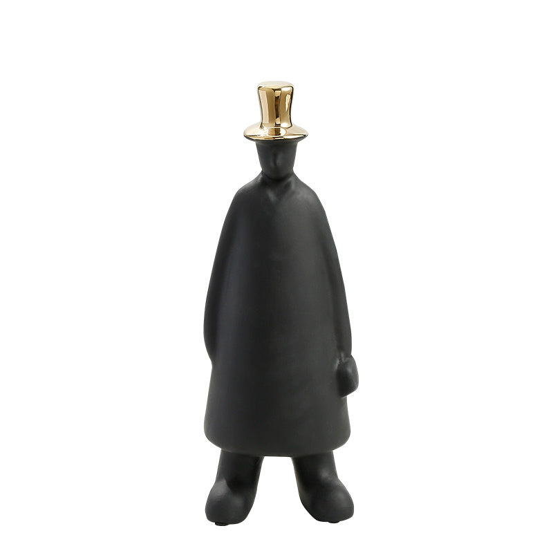 Sculpture décorative moderne silhouette noire avec chapeau doré design minimaliste pour intérieur élégant