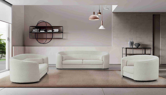 Salon moderne avec canapé et fauteuils arrondis au design épuré