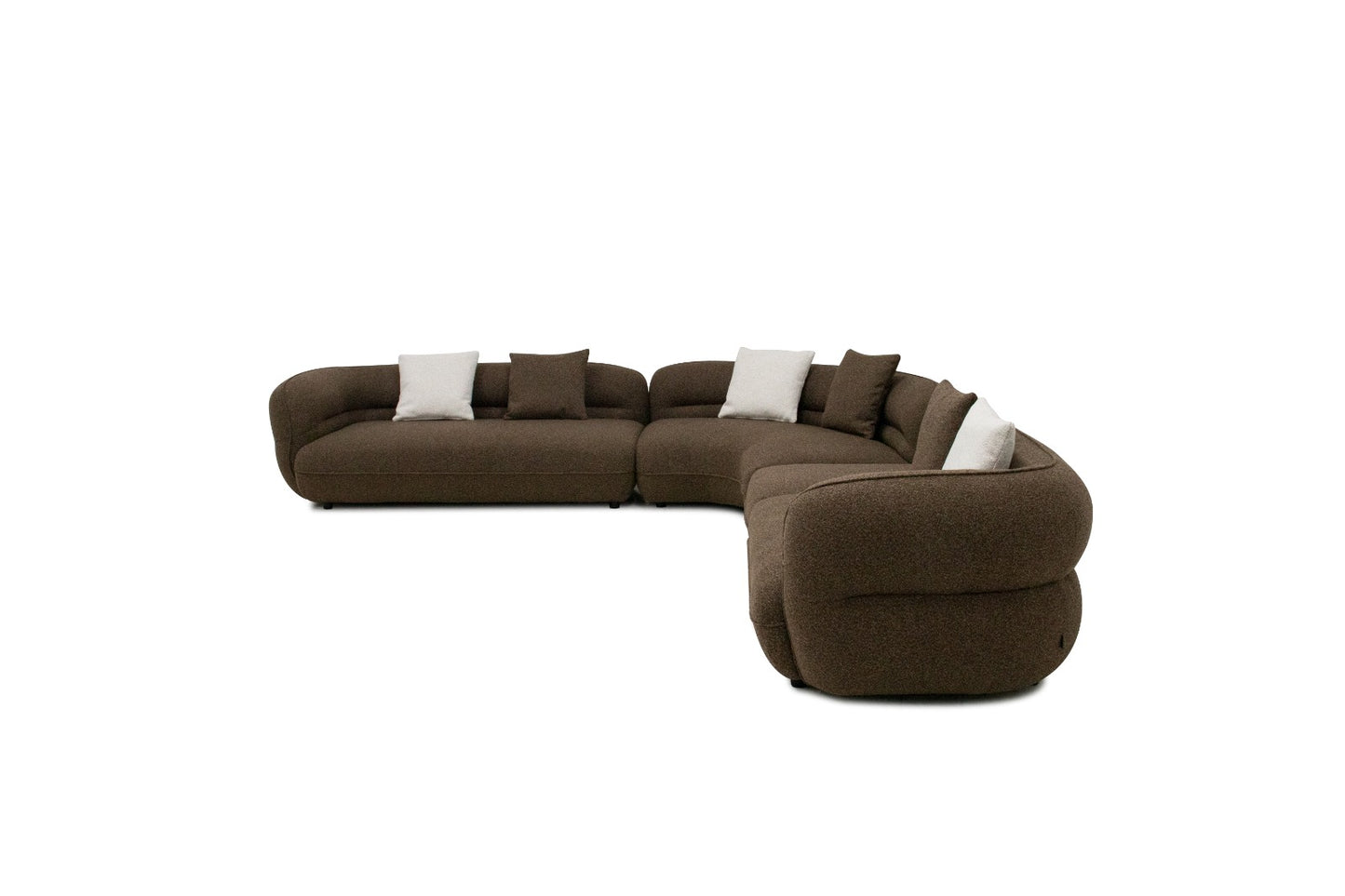 Canapé d'angle contemporain avec design arrondi, assise profonde et grand confort, idéal pour un salon moderne.