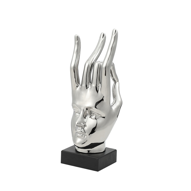 Sculpture visage abstrait chromé design moderne décoration intérieure luxe