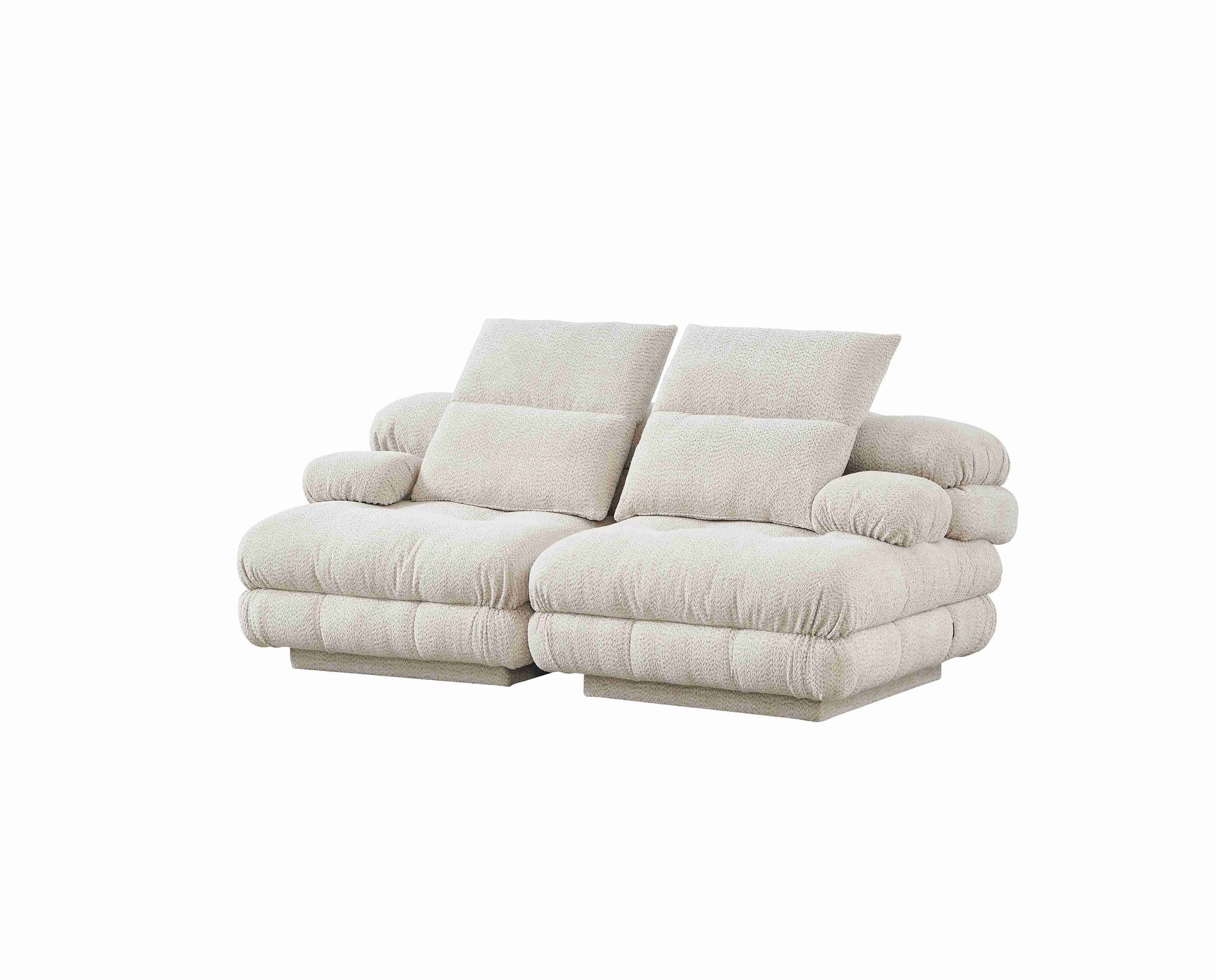 Canapé moderne deux places au design matelassé et formes volumineuses