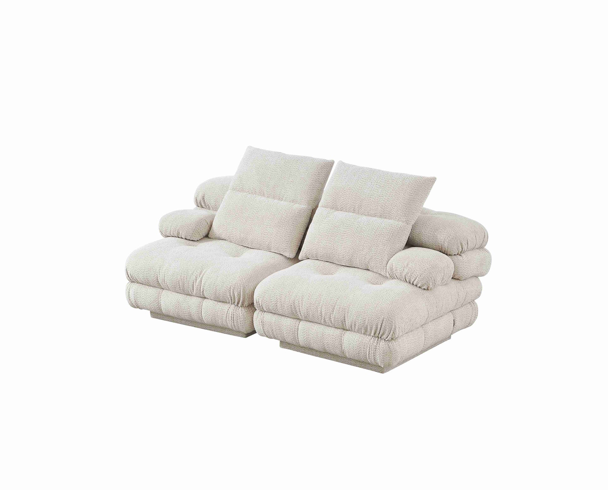 Canapé moderne deux places au design matelassé et formes volumineuses