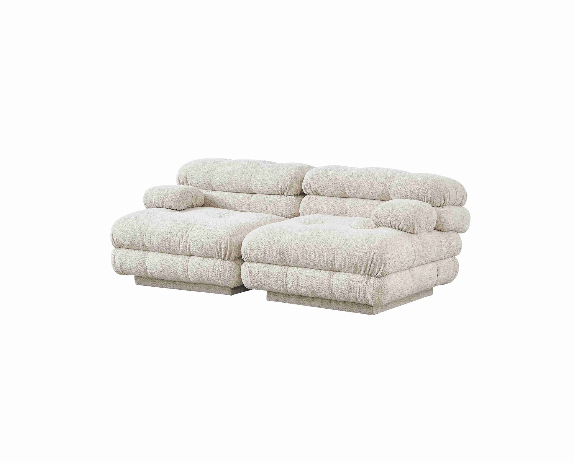 Canapé moderne deux places au design matelassé et formes volumineuses