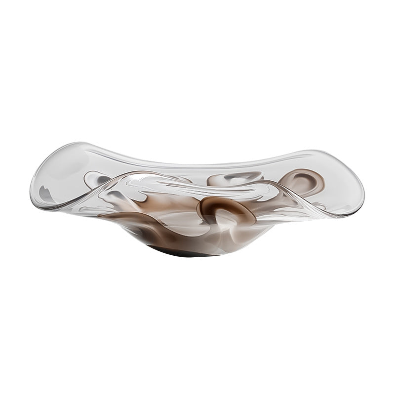 Coupe décorative en verre soufflé transparent aux formes organiques avec nuances fumées brunes et design contemporain élégant.
