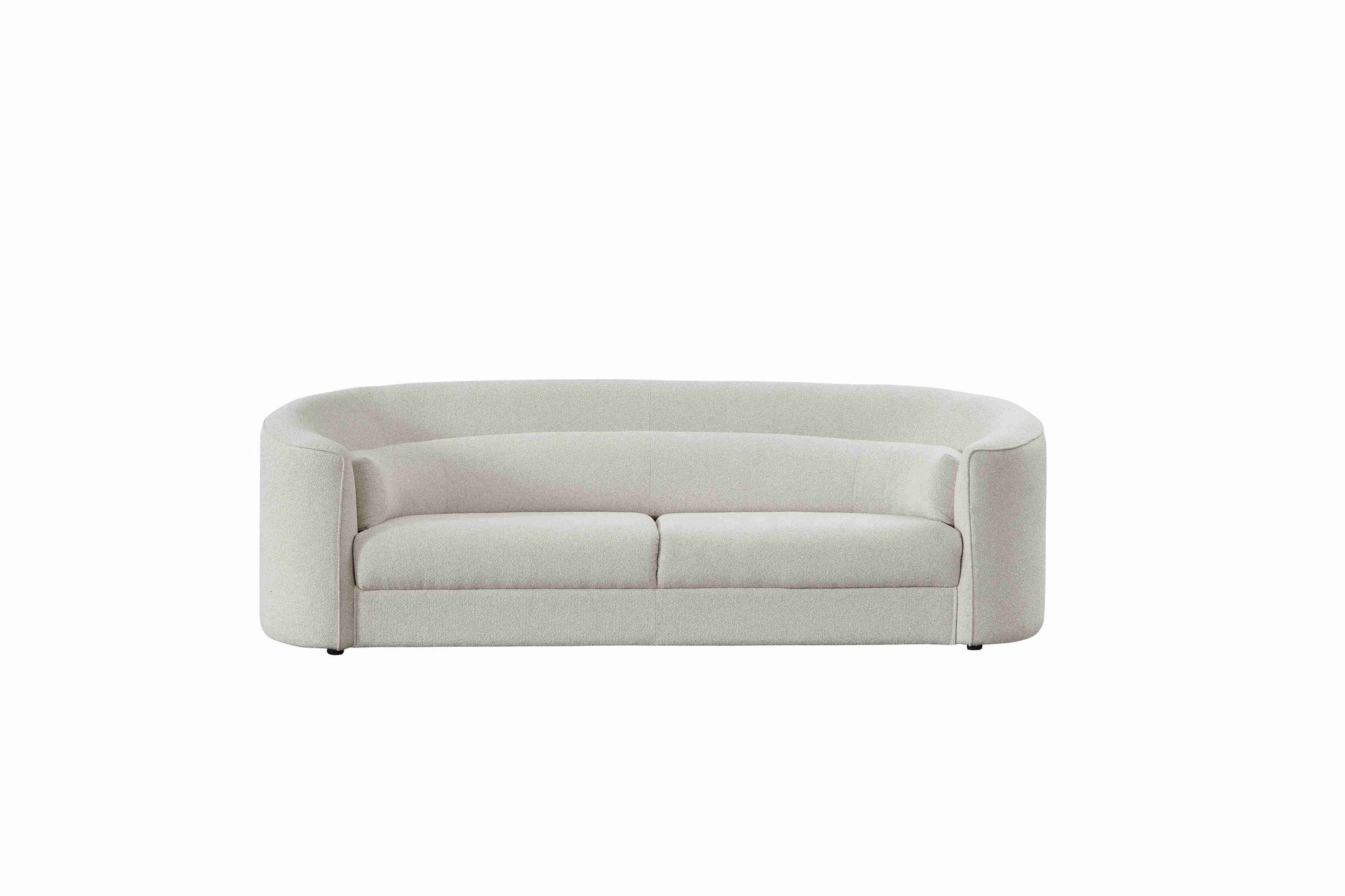 Salon moderne avec canapé et fauteuils arrondis au design épuré