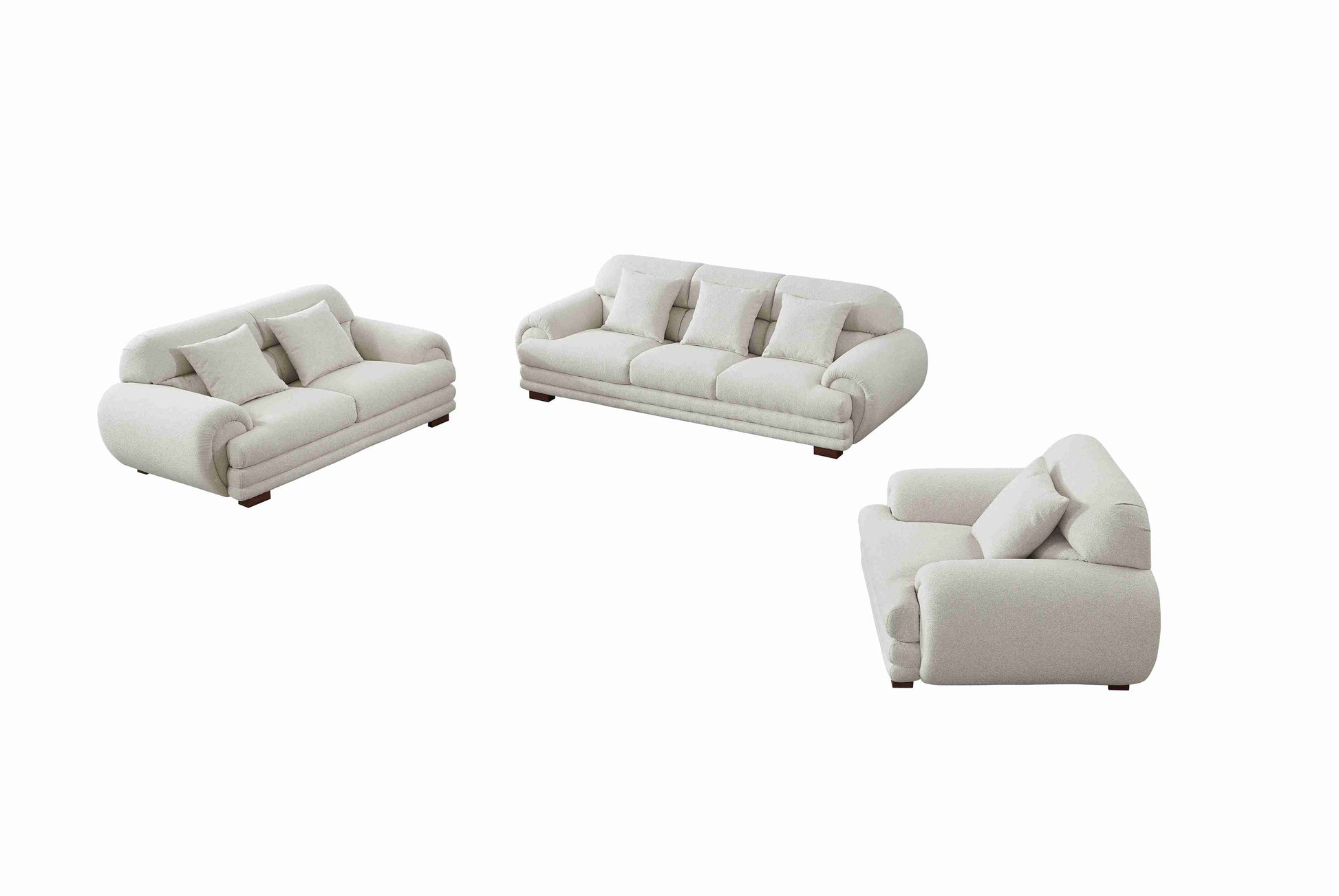 Salon élégant avec canapé trois places, deux places et fauteuil aux formes arrondies