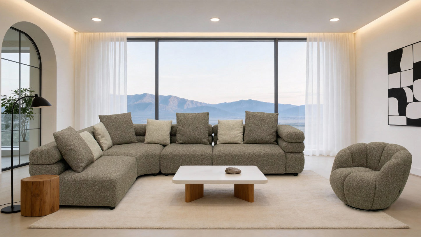 Canapé modulable beige en tissu texturé, avec assises profondes et coussins moelleux, dans un salon moderne et élégant