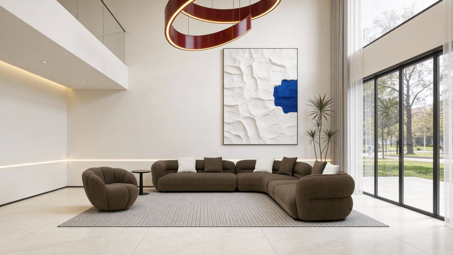 Canapé d'angle contemporain avec design arrondi, assise profonde et grand confort, idéal pour un salon moderne.